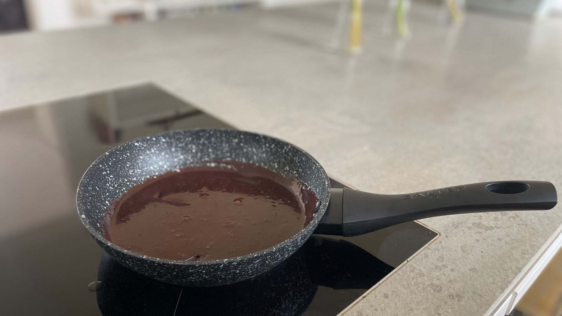 Chocolate sauce being made in the Salter Megastone Frying Pan Set