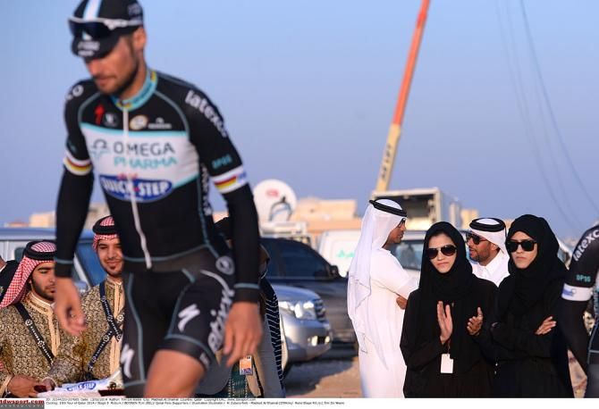 Onlookers watch Tom Boonen pass by