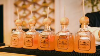 Patron bottles with paloma cocktails