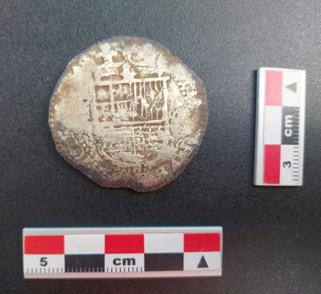 Images from a recent study that unearthed a silver coin