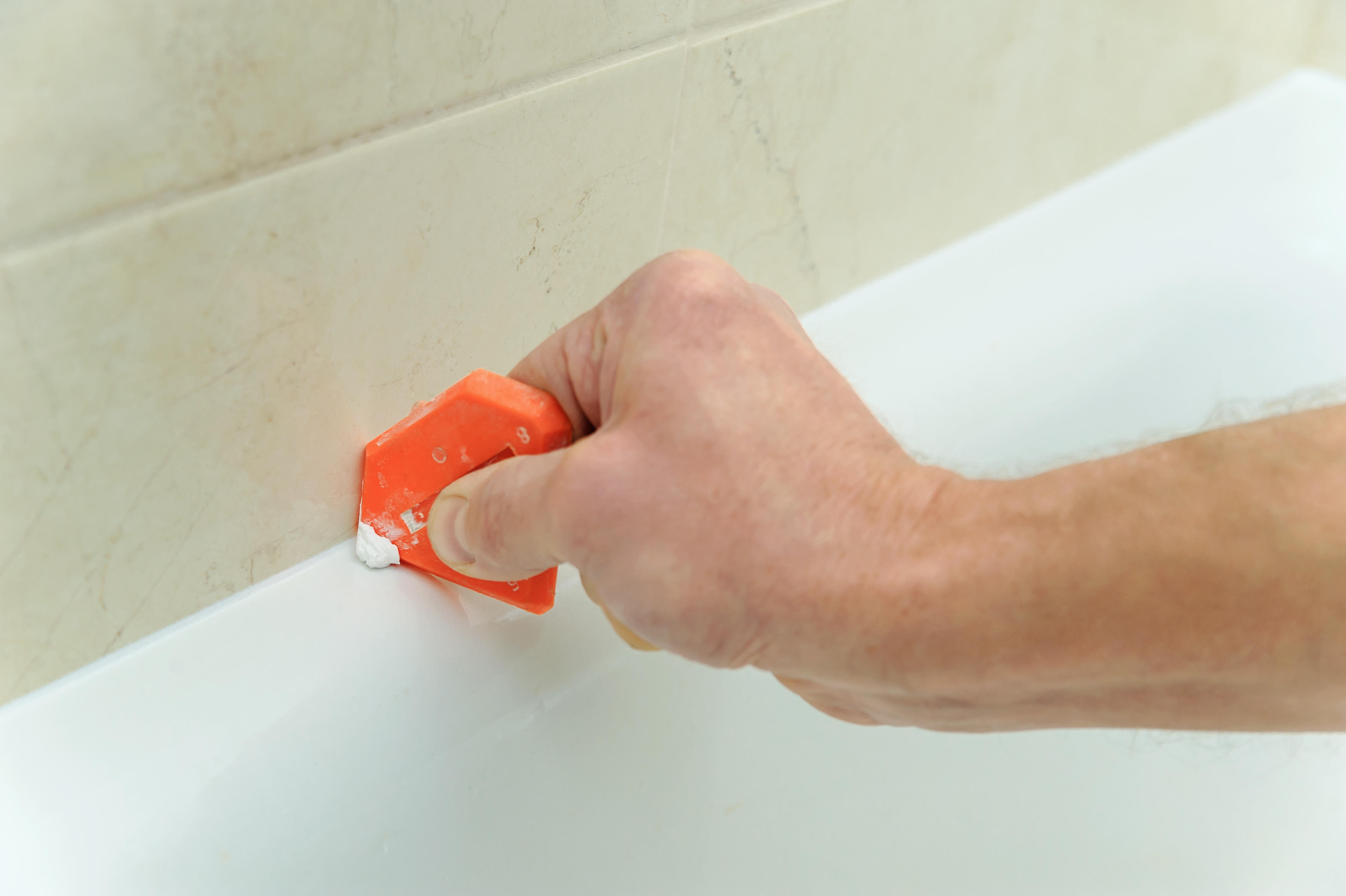 Replace shower clearance sealant