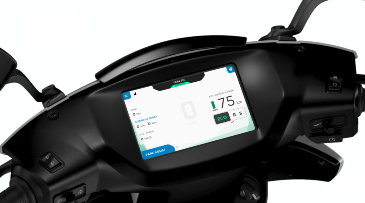 The digital dashboard showing engine status and expected range