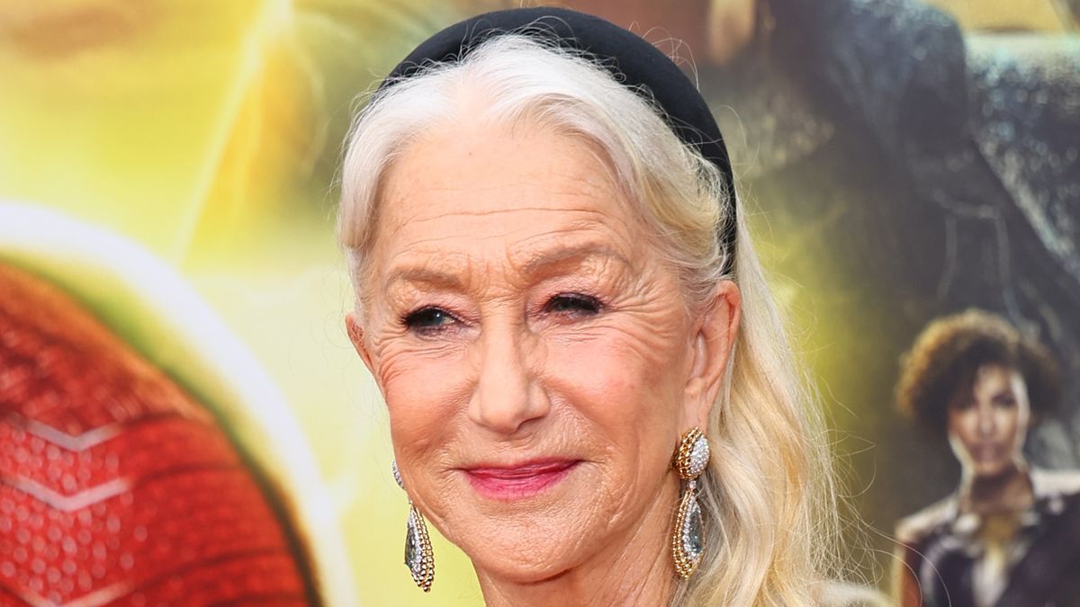 Helen Mirren's silver sequin Elie Saab bardot dress with draped sleeves and voluminous hair secures her status as Catwalk Queen