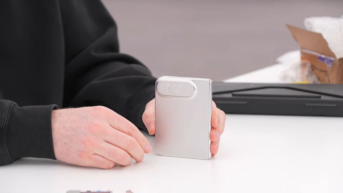 Unbox Therapy examines a dummy unit of Apple's folding iPhone Ultra.