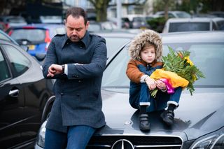 Mick Carter waits with Ollie Carter in EastEnders