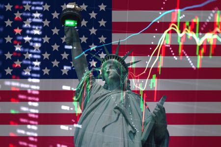 Statue of Liberty on the background of US stocks charts 