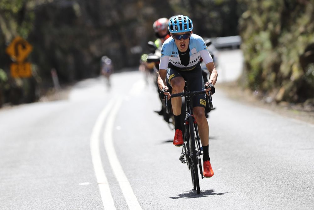 Ben Dyball attacks on the final climb.