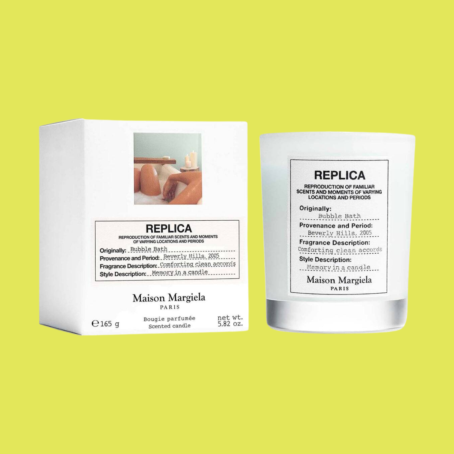 A glass candle and a white box