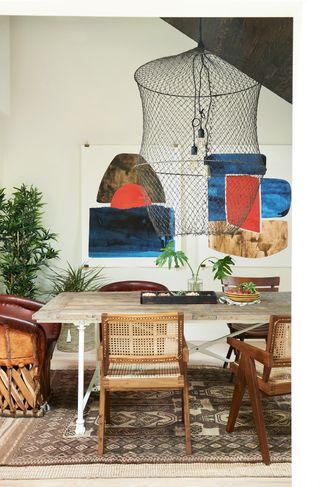 Dining room with prints in primary colors