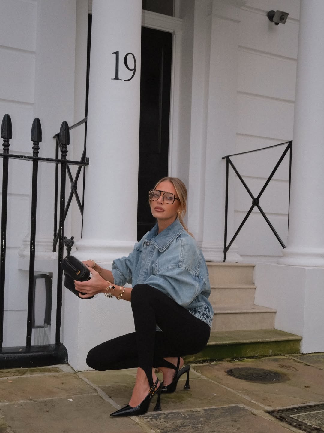 woman wearing black patent leather heels trend