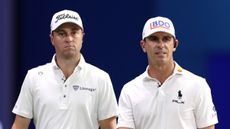 Justin Thomas (left) and Billy Horschel look on during a TGL match in 2026