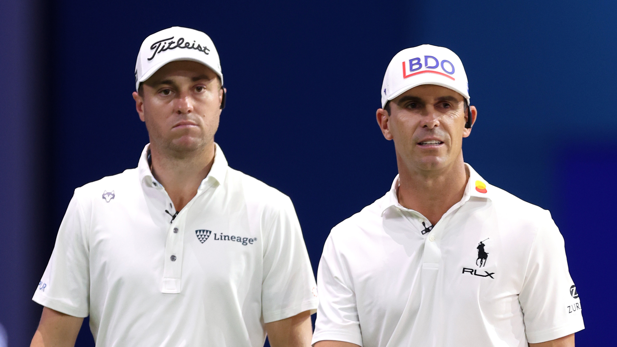 Justin Thomas (left) and Billy Horschel look on during a TGL match in 2026