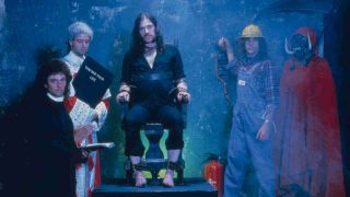 Motorhead recreating an electric chair scene in 1984