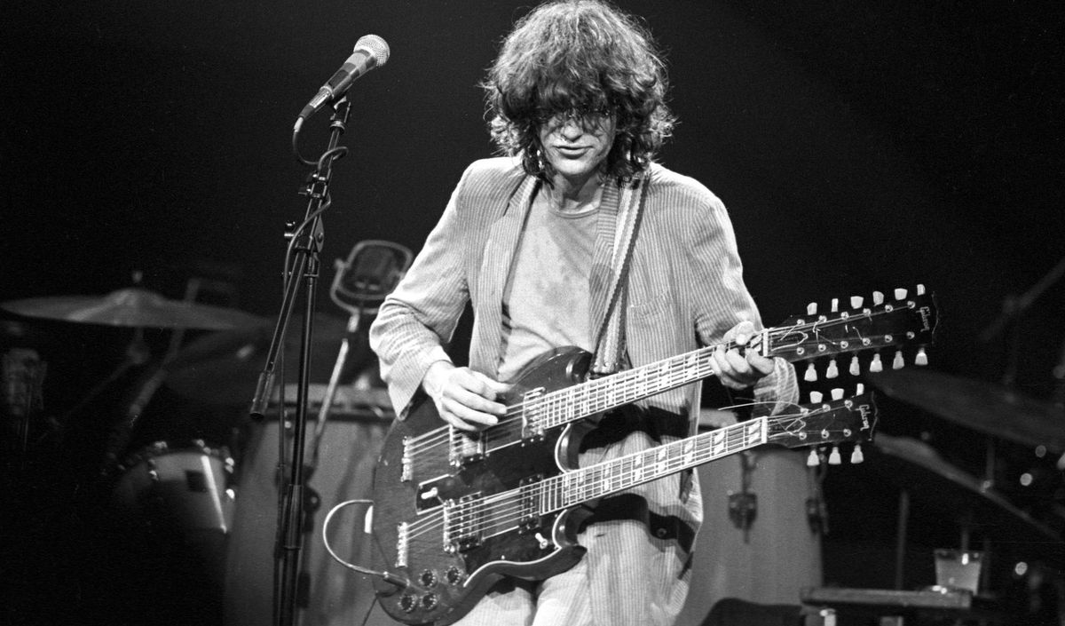 Jimmy Page plays his Gibson EDS-1275 at a benefit for Ronnie Lane&#039;s charity, ARMS, in 1983