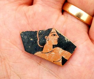 A fragment of red-and-black pottery from the late sixth century B.C. was probably painted by the ancient painter Paseas.