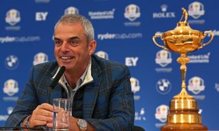 McGinley sits next to the Ryder Cup