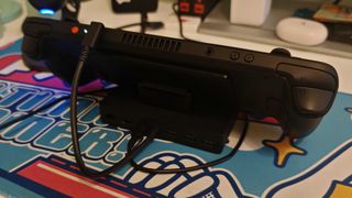 The Razer Handheld Dock Chroma with a Steam Deck inserted.