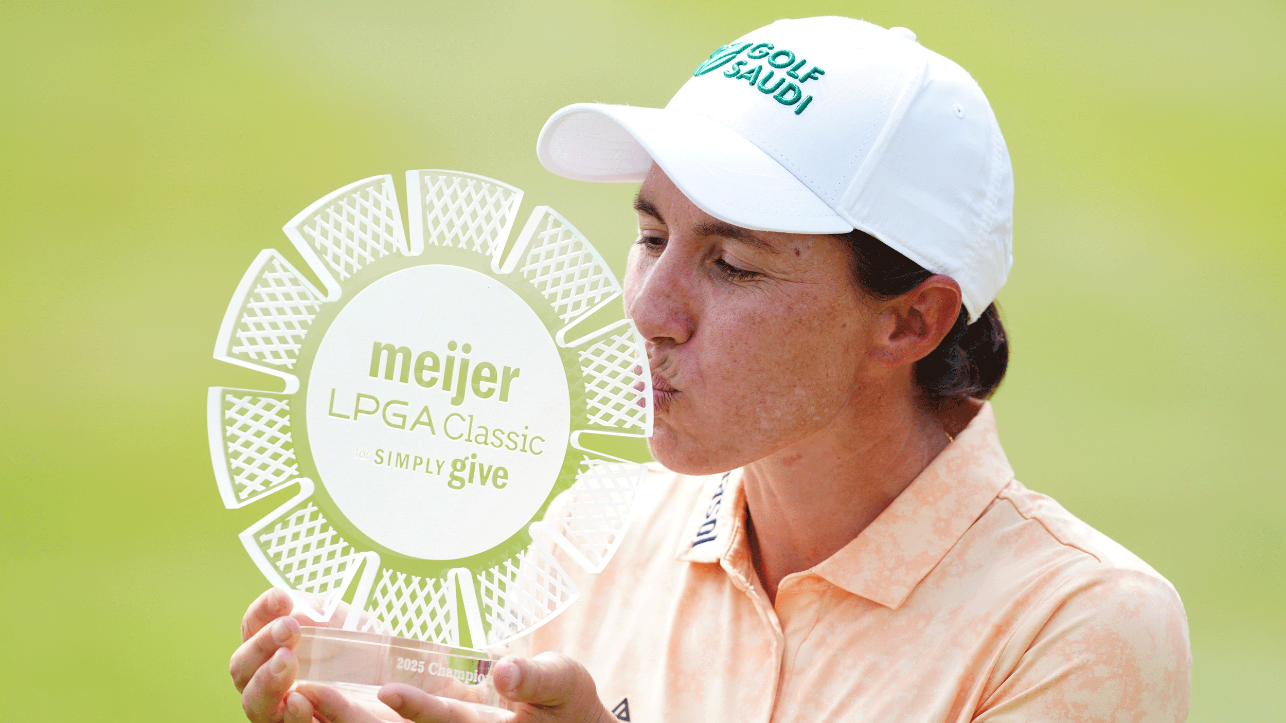 Carlota Ciganda kisses the Meijer LPGA Classic trophy following her win in 2025