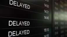 A digital flight board is showing delayed arrival flights at Sofia Airport in Sofia, Bulgaria