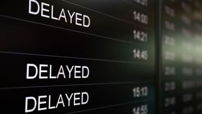 A digital flight board is showing delayed arrival flights at Sofia Airport in Sofia, Bulgaria