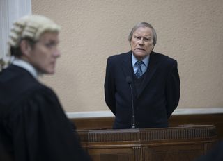 Roy is questioned by a barrister