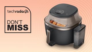 The Philips Airfryer 5000 Series with Steam on a light orange background with a TechRadar deals logo