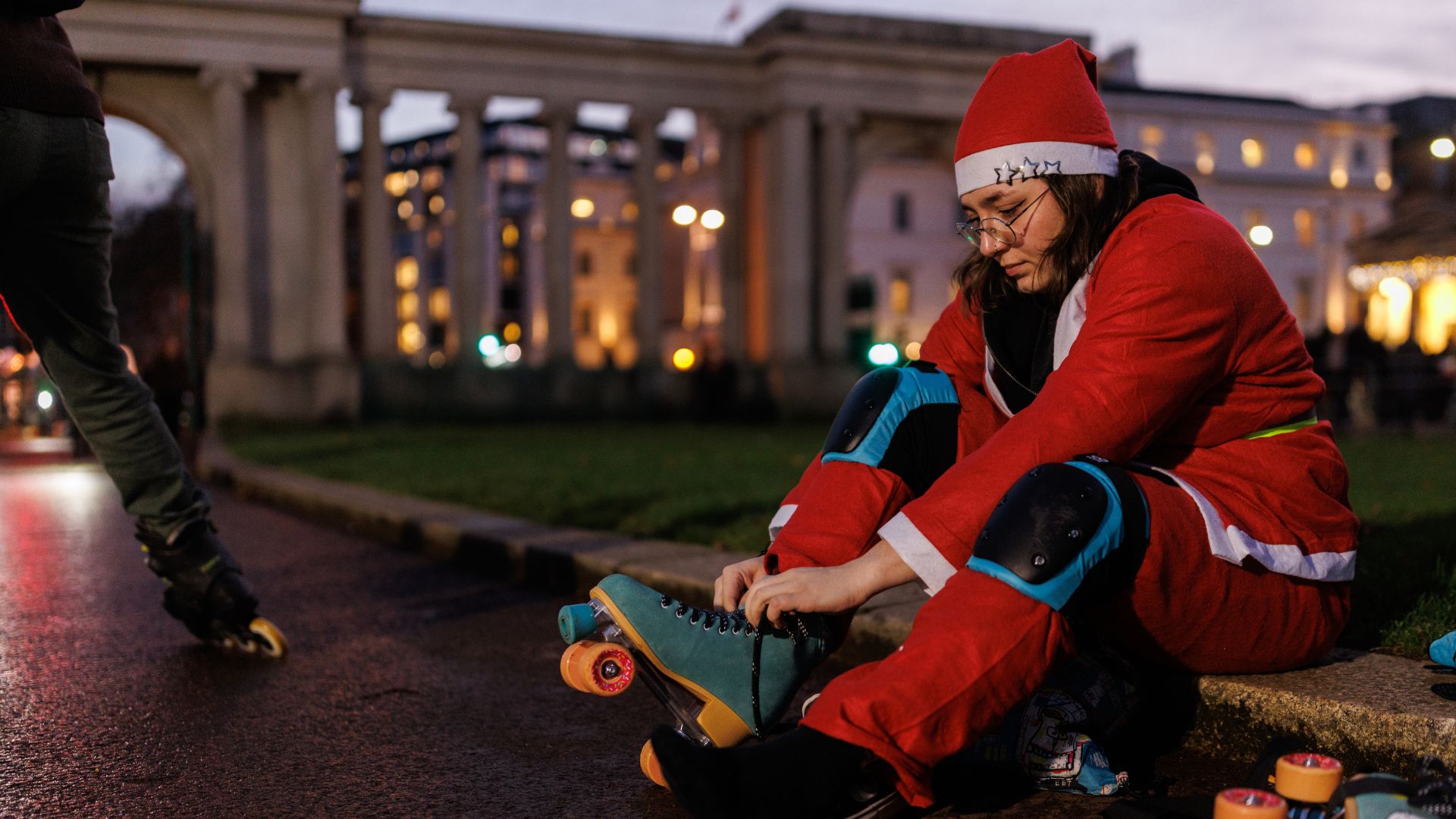 LONDON, ENGLAND - DECEMBER 14: Skaters dressed as Santa get ready before making their way through the streets of central London on December 14, 2024 in London, England. Around 300 hundred people took part in the event which is run by LondonSkate. (Photo by Dan Kitwood/Getty Images)
