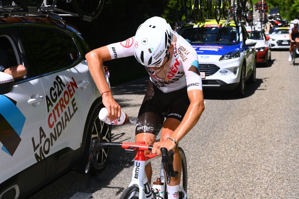 GRENCHEN SWITZERLAND JUNE 14 Clment Champoussin of France and AG2R Citren Team refreshes himself during the 85th Tour de Suisse 2022 Stage 3 a 1769km stage from Aesch to Grenchen ourdesuisse2022 WorldTour on June 14 2022 in Grenchen Switzerland Photo by Tim de WaeleGetty Images
