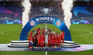 Bayern Munich players celebrate their Champions League final win over Paris Saint-Germain at an empty Estádio da Luz in Lisbon in August 2020, with no fans allowed at the game due to the Covid-19 pandemic.