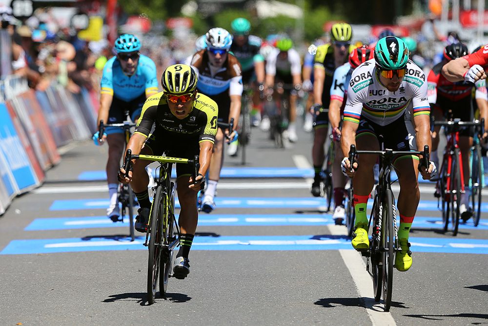 Caleb Ewan and Peter Sagan cross the finish line of stage 1 at the Tour Down Under