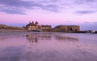 The sand beach of Beadnell Bay on the coast of Northumberland, England