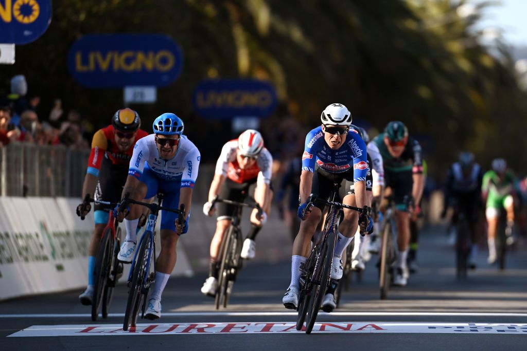 SAN BENEDETTO DEL TRONTO ITALY MARCH 12 EDITORS NOTE Alternate crop Jasper Philipsen of Belgium and Team AlpecinDeceuninck celebrates at finish line as stage winner ahead of Dylan Groenewegen of The Netherlands and Team Jayco AlUla during the 58th TirrenoAdriatico 2023 Stage 7 a 154km stage from San Benedetto del Tronto to San Benedetto del Tronto UCIWT TirrenoAdriatico on March 12 2023 in San Benedetto del Tronto Italy Photo by Tim de WaeleGetty Images