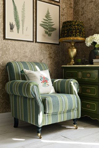 living room with botanical wallpaper and art and vintage style lamp by mindthegap