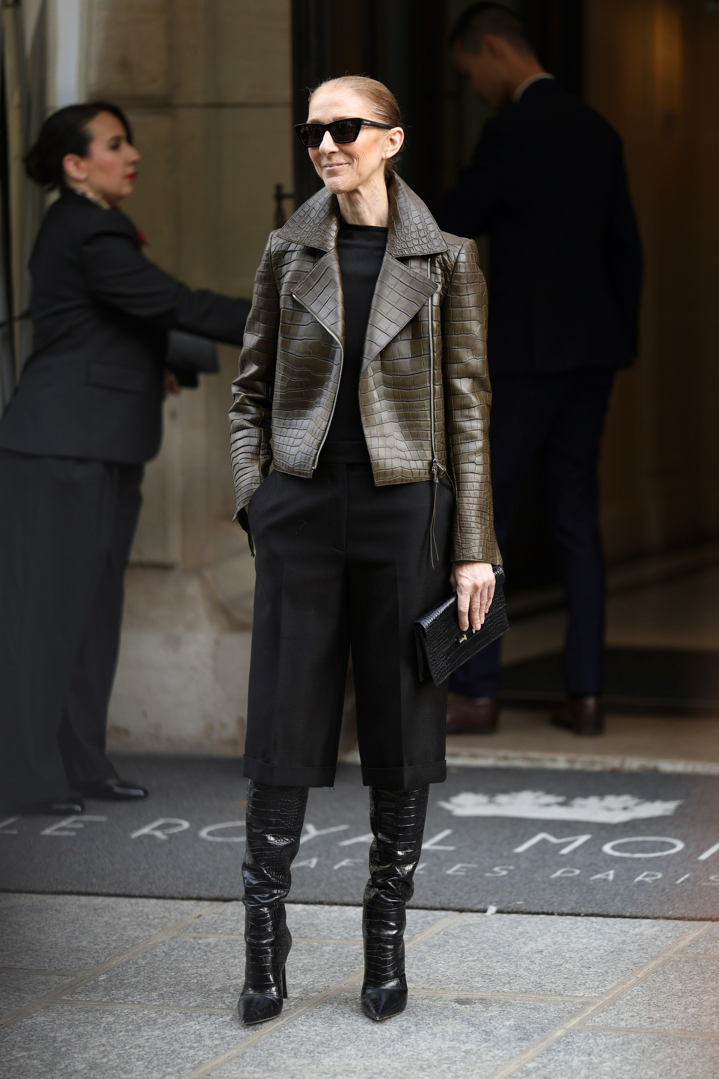 C&amp;eacute;line Dion styled the Bermuda shorts trend for fall with a croc-embossed leather jacket and matching boots