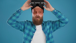Man wearing VR headset reveals burnt face
