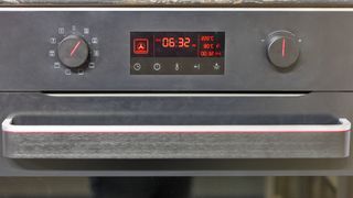A close up of an oven's control panel