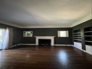 An empty room painted in dark green