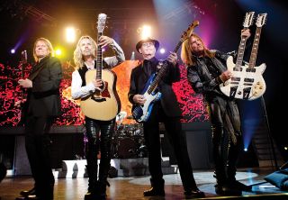 No new album, but plenty of guitars: (l-r) James Young, Tommy Shaw, Chuck Panozzo and Ricky Phillips live at the Roanoke Civic Center in 2013