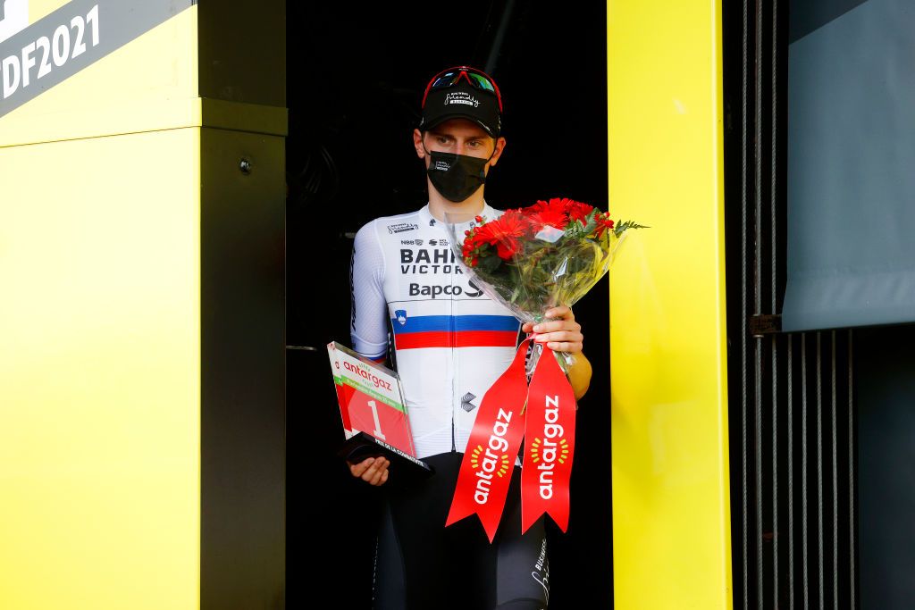 LIBOURNE FRANCE JULY 16 Matej Mohori of Slovenia and Team Bahrain Victorious stage winner and most combative rider celebrates at podium during the 108th Tour de France 2021 Stage 19 a 207km stage from Mourenx to Libourne LeTour TDF2021 on July 16 2021 in Libourne France Photo by Chris GraythenGetty Images