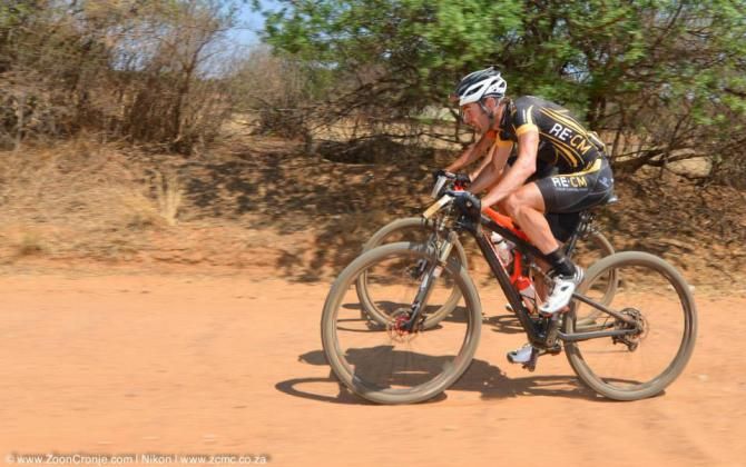 Eventual winner, Waylon Woolcock, of Team RE:CM and runner-up, Nico Bell (Westvaal Bells Cycling), share the pace-setting as they pursue the breakaway group during the 2013 MTN Ride Crater Cruise