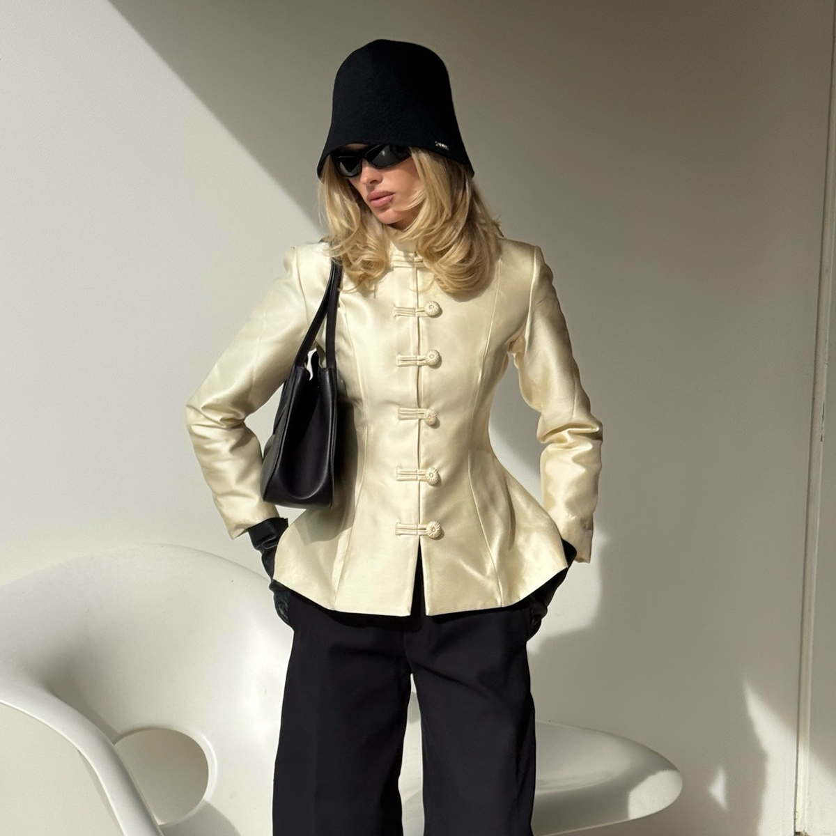 Elsa Hosk wearing the frog closure jacket trend