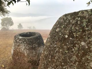 A local legend says that the giant carved stone jars were made by a race of giants, who use them to brew rice beer in celebration of an ancient victory in war.