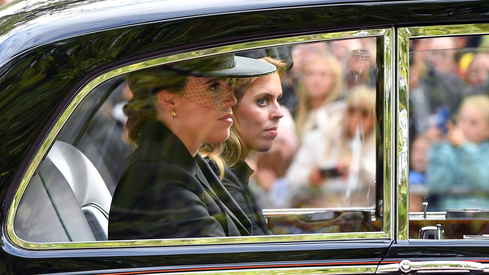 LONDON, ENGLAND - SEPTEMBER 19: Princess Beatrice, recently appointed as Counsellor of State (L) and Princess Eugenie of York leave Westminster Abbey during the State Funeral of Queen Elizabeth II on September 19, 2022 in London, England. Elizabeth Alexandra Mary Windsor was born in Bruton Street, Mayfair, London on 21 April 1926. She married Prince Philip in 1947 and ascended the throne of the United Kingdom and Commonwealth on 6 February 1952 after the death of her Father, King George VI. Queen Elizabeth II died at Balmoral Castle in Scotland on September 8, 2022, and is succeeded by her eldest son, King Charles III. (Photo by Anthony Devlin/Getty Images)