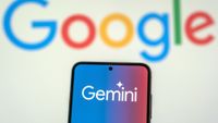 Gemini logo on smartphone with the Google logo behind