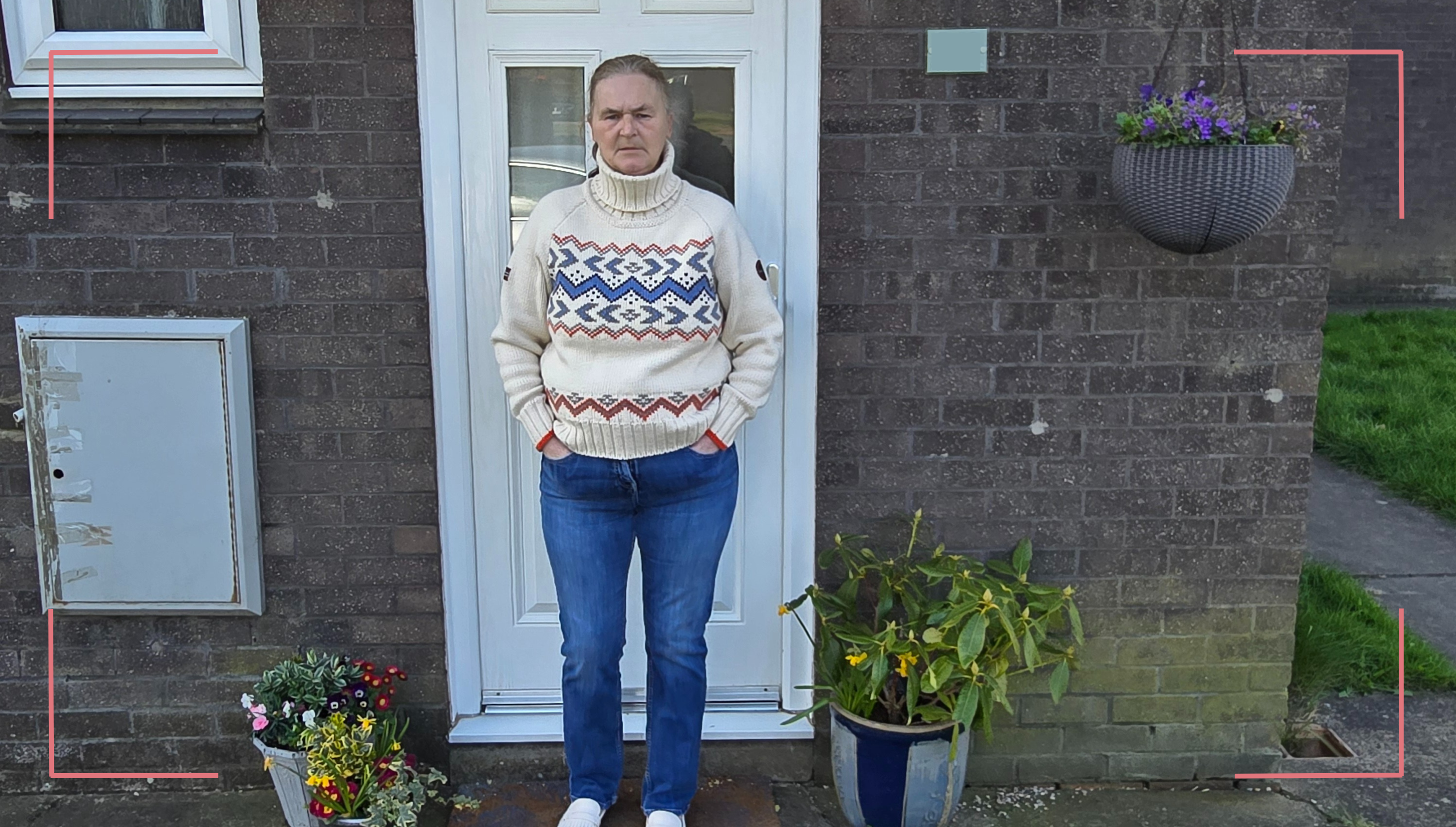 Kinship carer Koreena stands outside a home