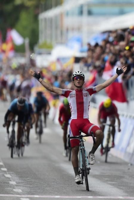 Michal Kwiatkowski (Poland) celebrates his world title victory