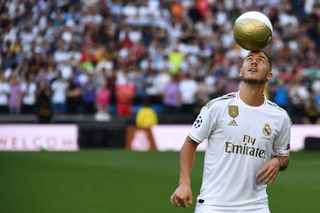 Eden Hazard plays with a ball during his official presentation as a Real Madrid player in June 2019.