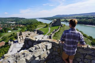 Image shows Stefan looking out to the Danube river at Devín castle in Slovakia