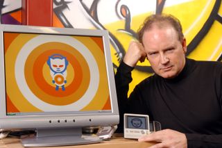 Napster CEO posing with logo on desktop