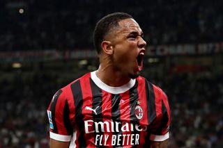 Noah Okafor of AC Milan celebrates scoring his team's second goal during the Serie A match between AC Milan and Torino at Stadio Giuseppe Meazza on August 17, 2024 in Milan, Italy.